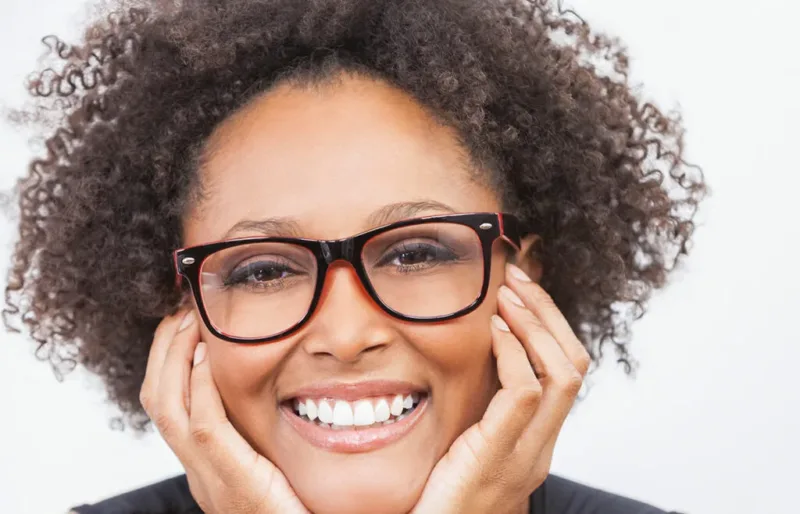 oral-cancer-screening Woman smiling after oral cancer screening.